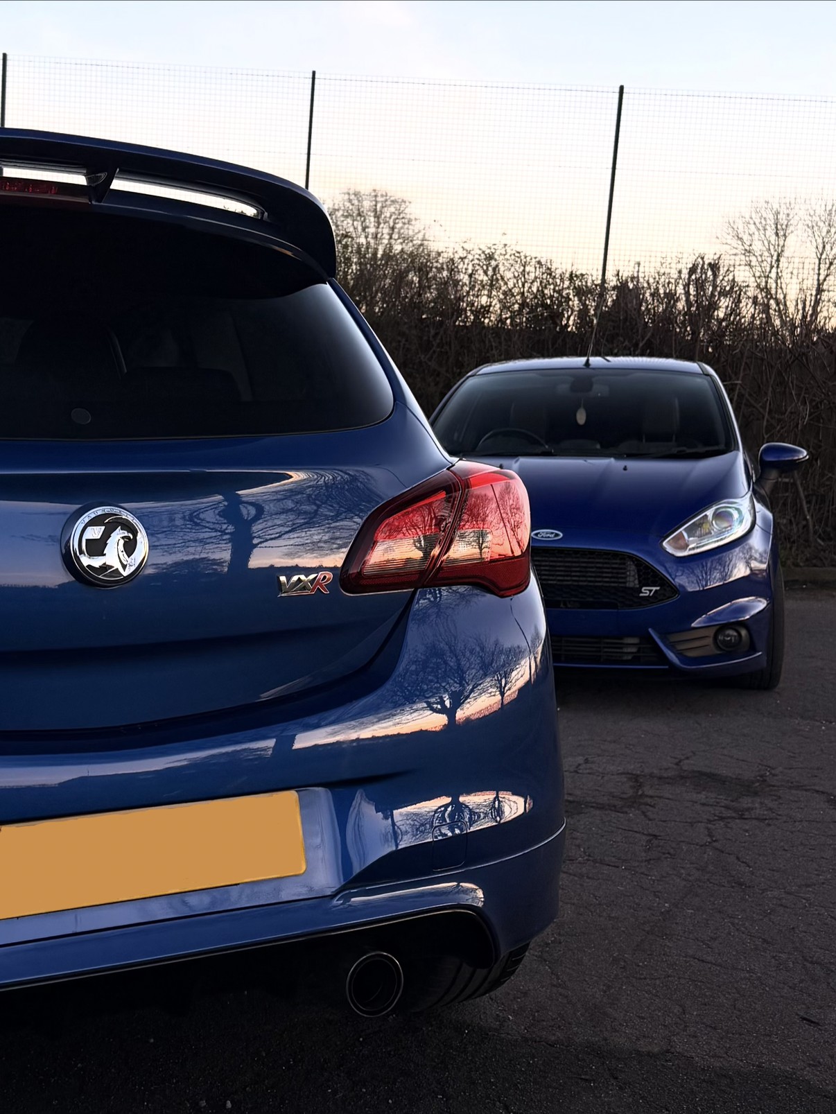 Freshly finished blue Vauxhall Corsa VXR and Ford Fiesta ST