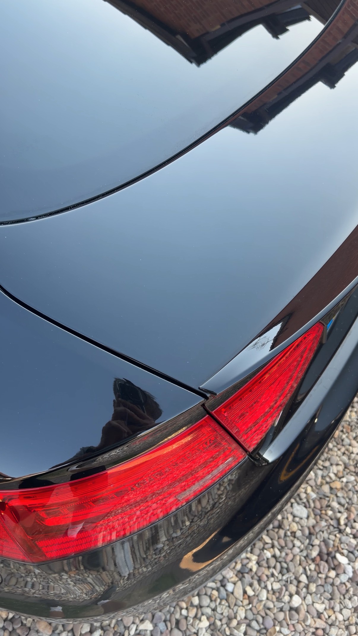 Glossy reflective finish on a car boot after a Single Stage Enhancement